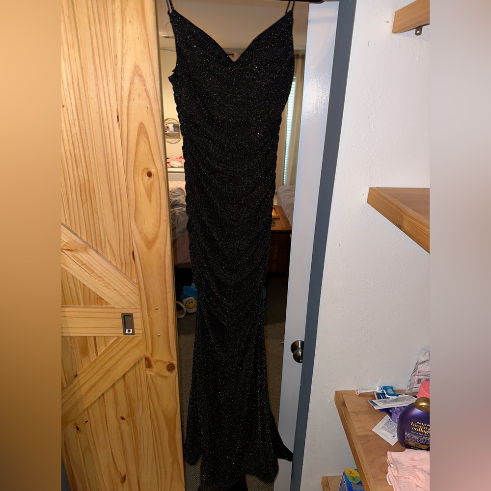 BEAUTIFUL B. Darlin sparkly, black mermaid prom dress.